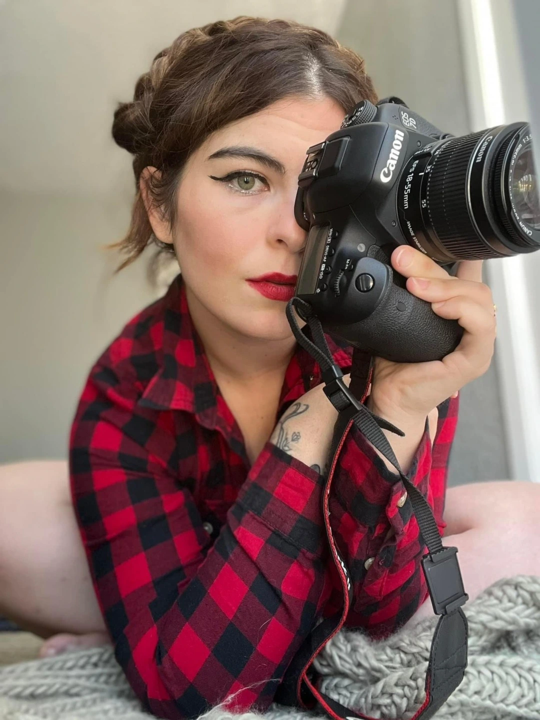 Kelsie Stark holding camera